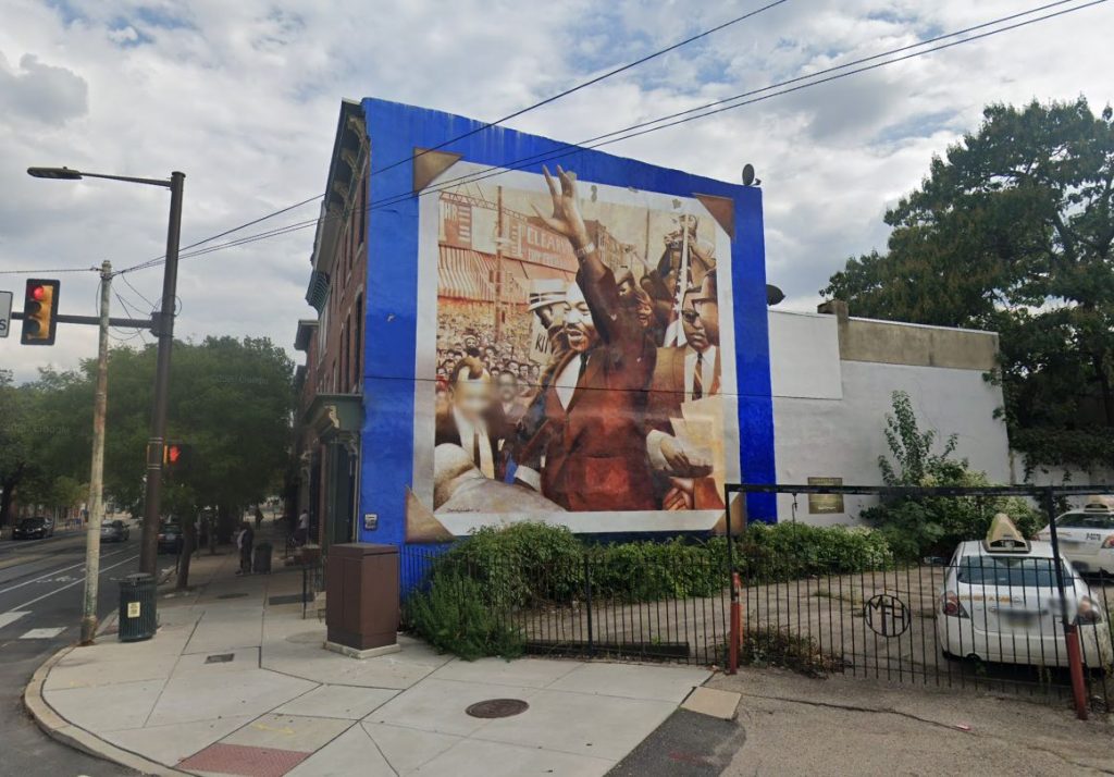A mural of Rev. Martin Luther King, Jr. Looking south. Credit: Google Maps