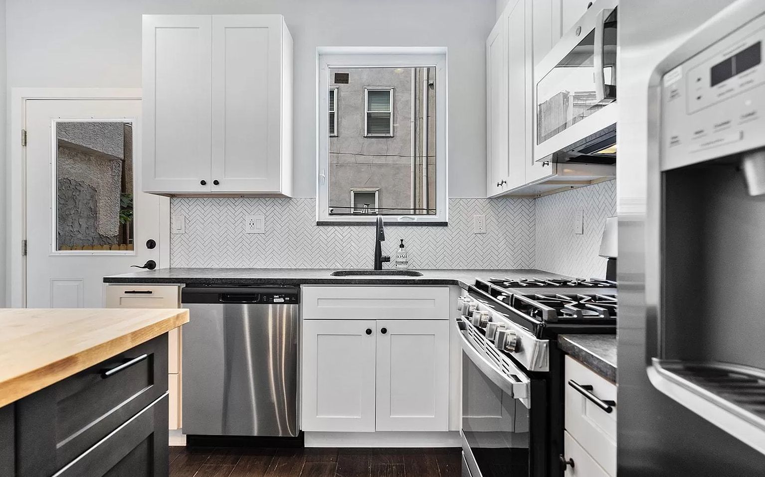 Construction Complete at ThreeStory Rowhouse at 2023 Oakford Street in