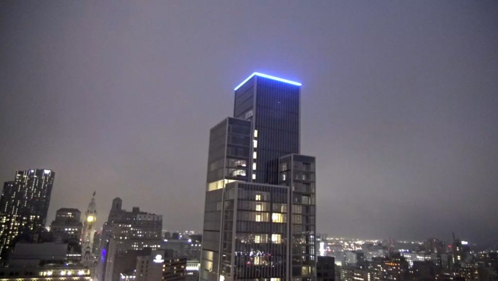 Arthaus lit blue. Image by Earthcam