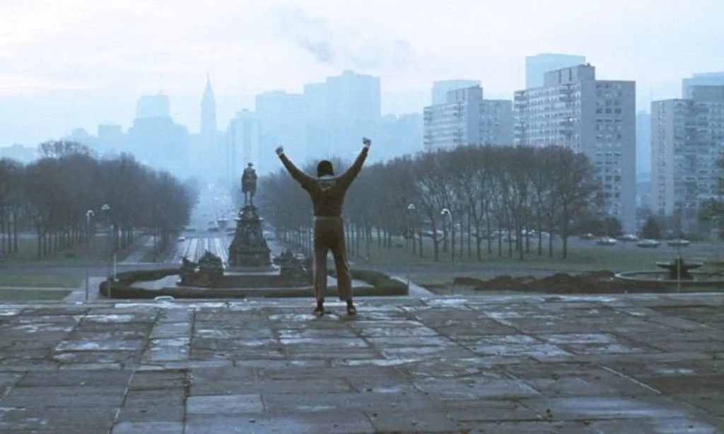 The iconic scene from Rocky (1976), with 1776 Benjamin Franklin Pparkway visible in the center left