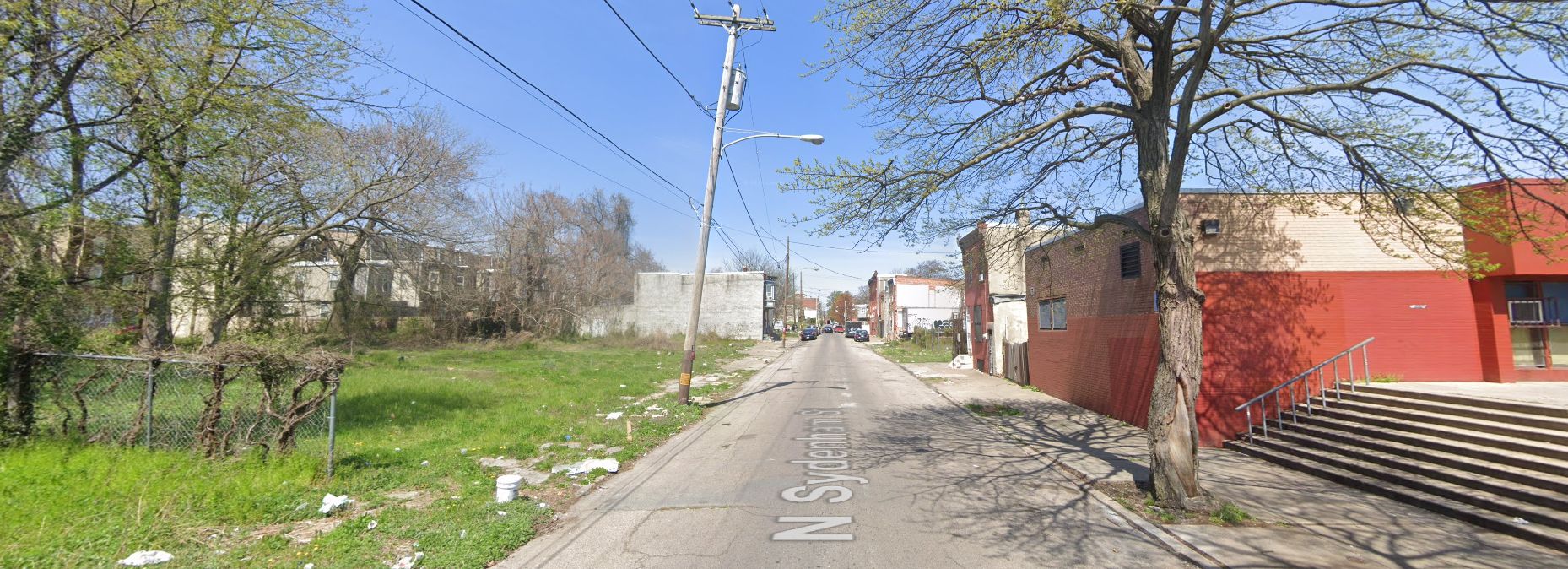 North Sydenham Street, with 2314 North Sydenham Street on the left. Site conditions prior to redevelopment. Looking north. April 2023. Credit: Google Maps