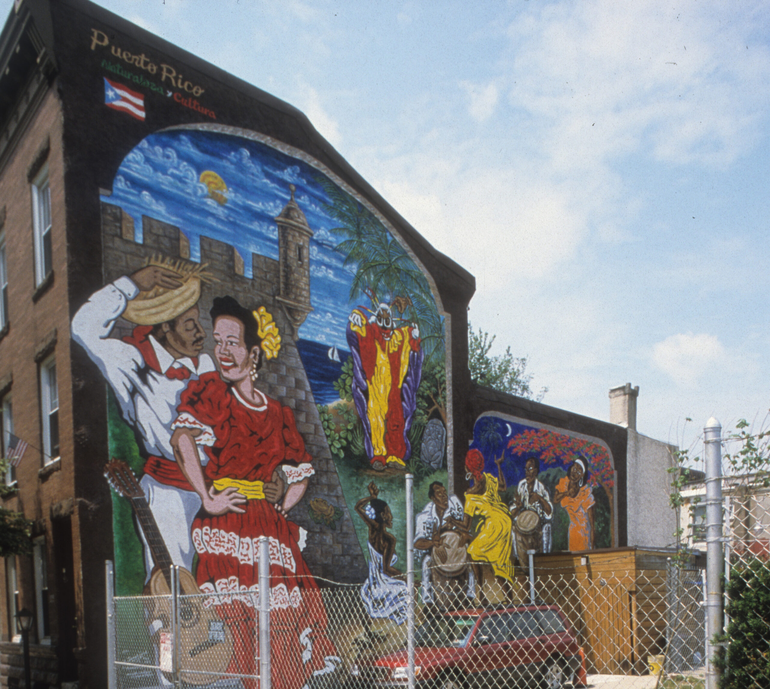 Mural at 2124 North 2nd Street: Tribute to Puerto Rican Culture, by Samuel Lind, 2002. Photo by Jack Ramsdale via the City of Philadelphia Mural Arts Program